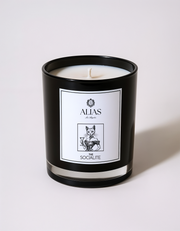 The Socialite luxury candle by Alias Los Angeles – glossy black jar with a sophisticated blend of jasmine, saffron, and amber; a glamorous soy wax candle perfect for entertaining, stylish home décor, and elegant gifting