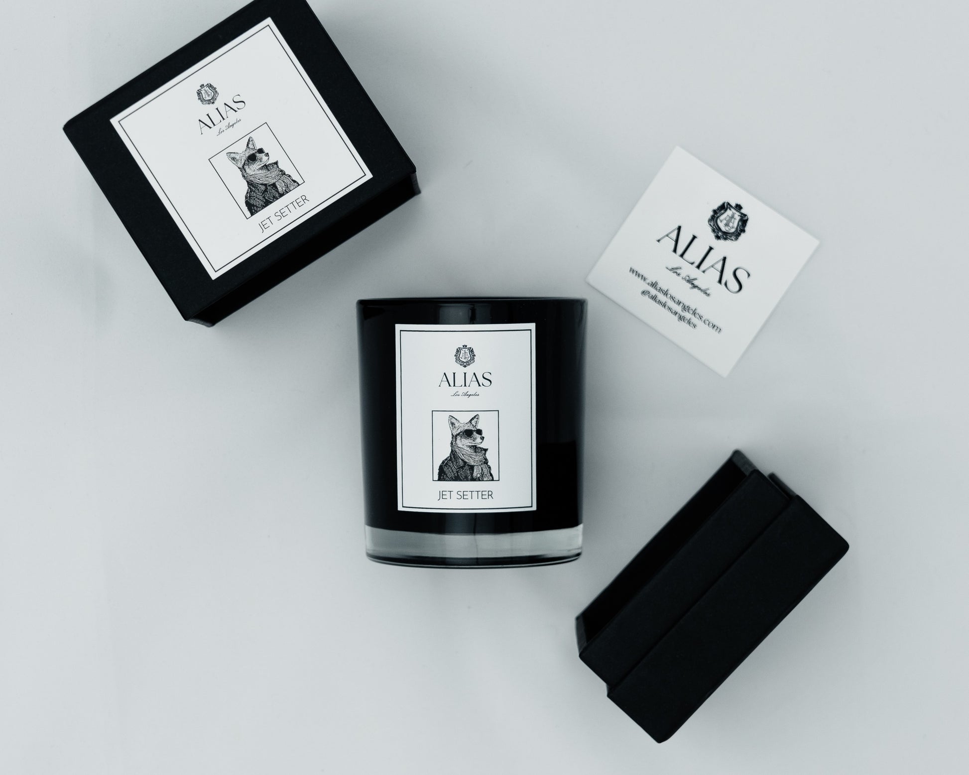 Luxury Jet Setter candle by Alias Los Angeles featuring citrus bergamot smoky black tea and warm cedarwood for a sophisticated travel inspired home fragrance
