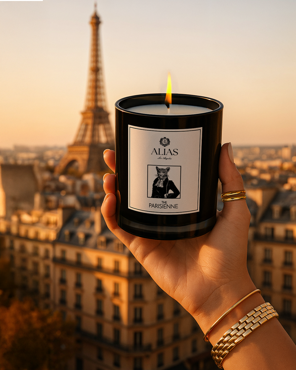 The Parisienne luxury candle by Alias Los Angeles – glossy black jar featuring a romantic blend of modern rose, black currant, and soft musk; an elegant soy wax candle inspired by Parisian charm, perfect for gifting or refined home ambiance.