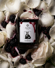 The Parisienne luxury candle by Alias Los Angeles with rose and black currant berry fragrance inspired by Paris Tuileries Gardens in elegant packaging